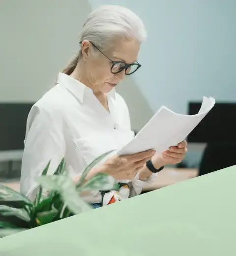 Woman Reading a Document